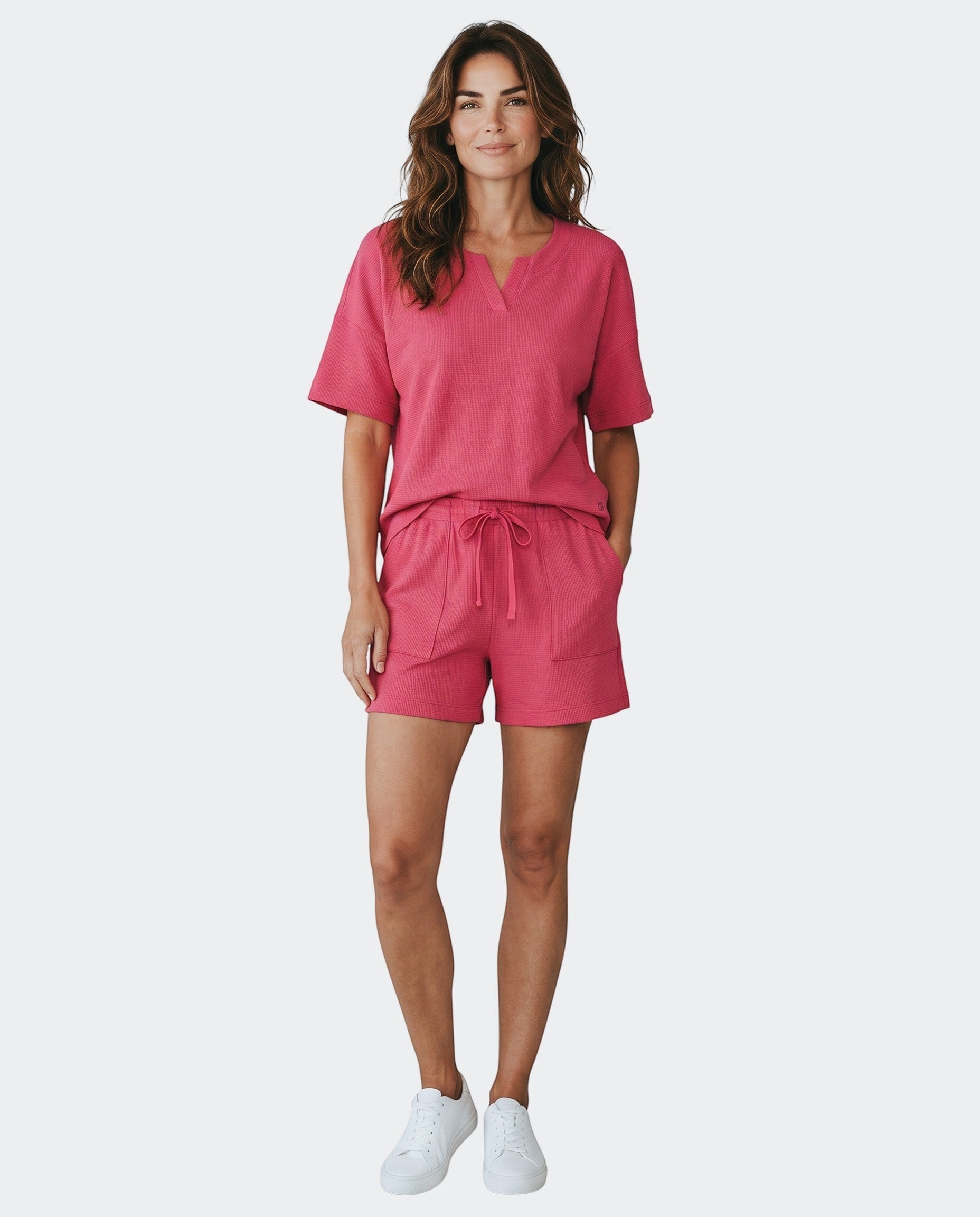 Maison Sarava women's relaxed fit pink textured knit top and shorts set made of TENCEL™ Modal and elastane.