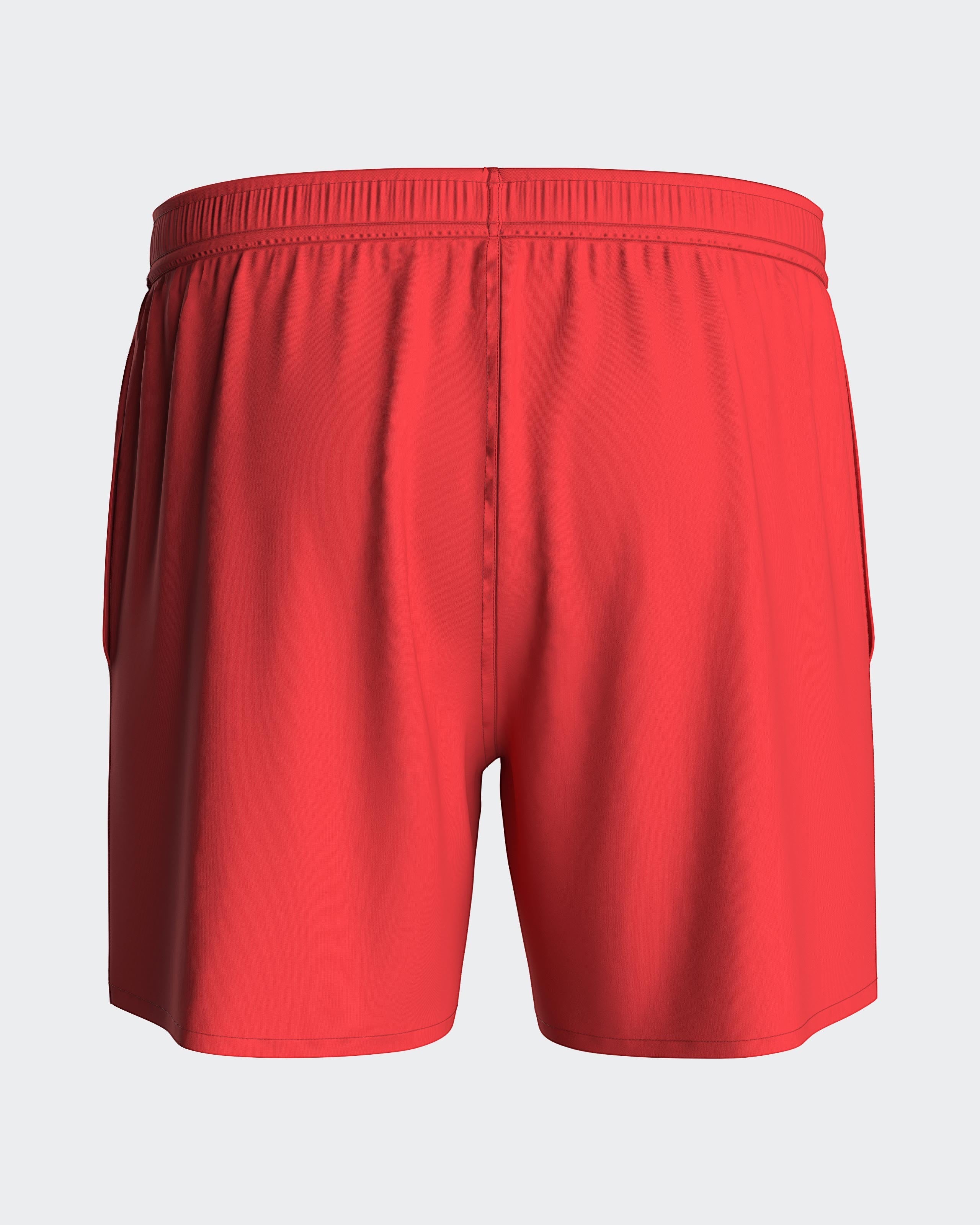 Maison Sarava red polyester men's swim shorts with adjustable drawstring waist and side pockets.