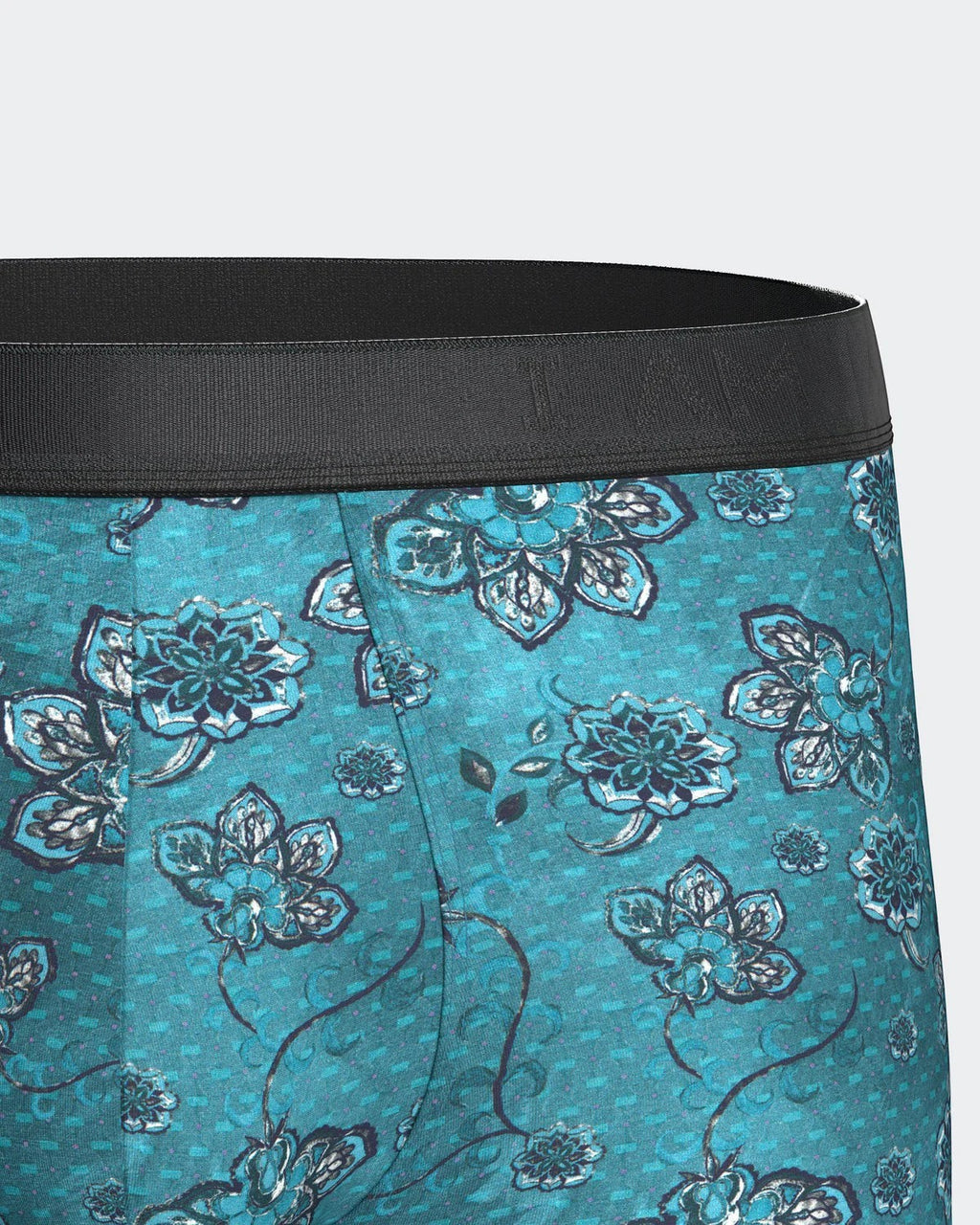 Maison Sarava men's boxer briefs in teal with a blue and white floral print, made from TENCEL Lyocell.