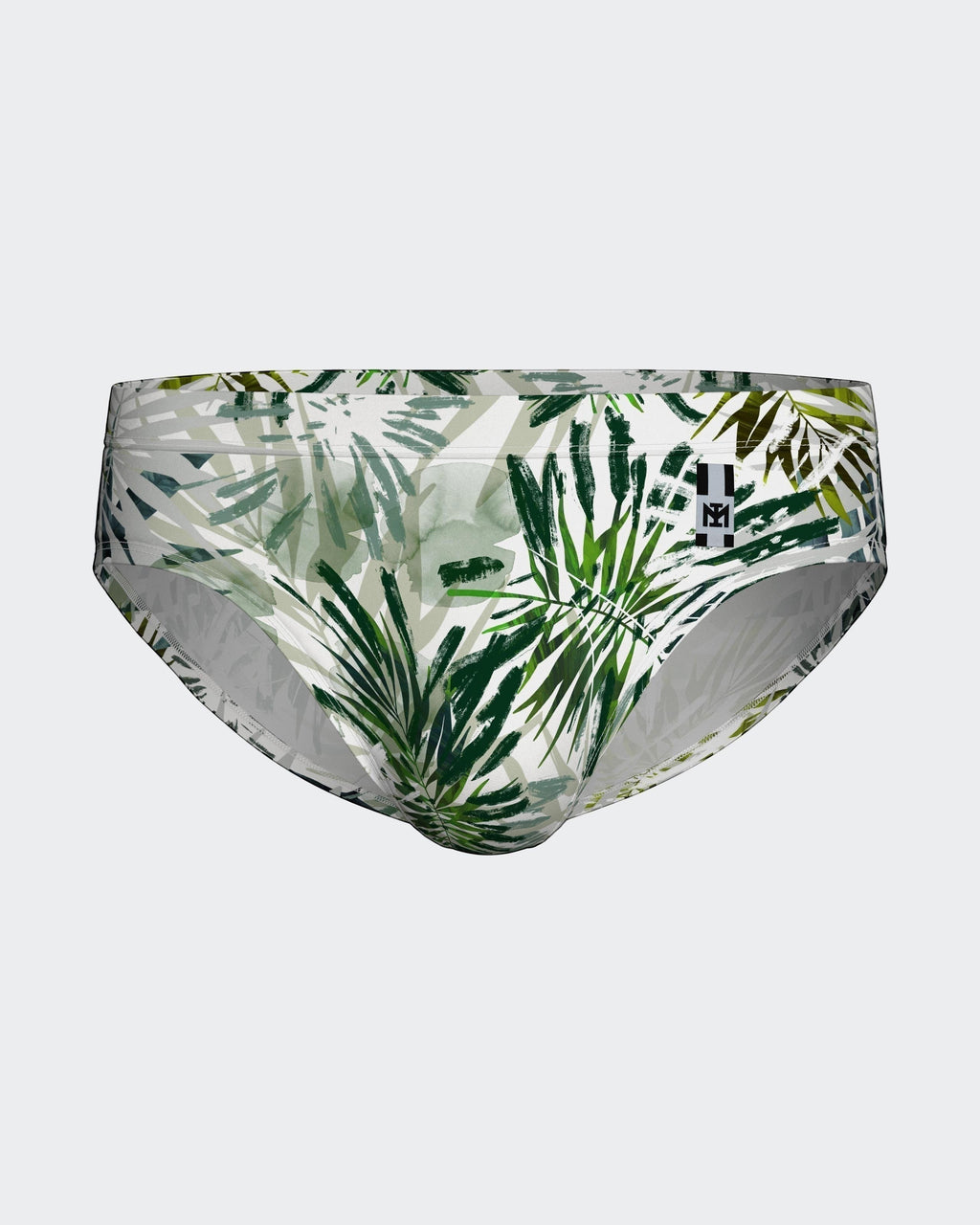 Maison Sarava tropical leaf print swim briefs in green and white. Form-fitting, quick-drying fabric.