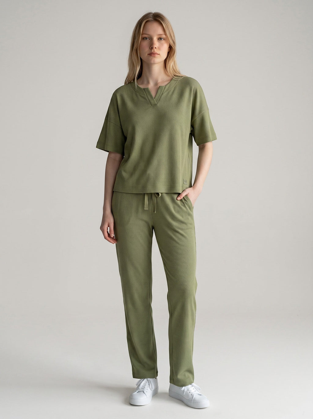 Maison Sarava women's olive green lyocell lounge set with v-neck top and drawstring pants.