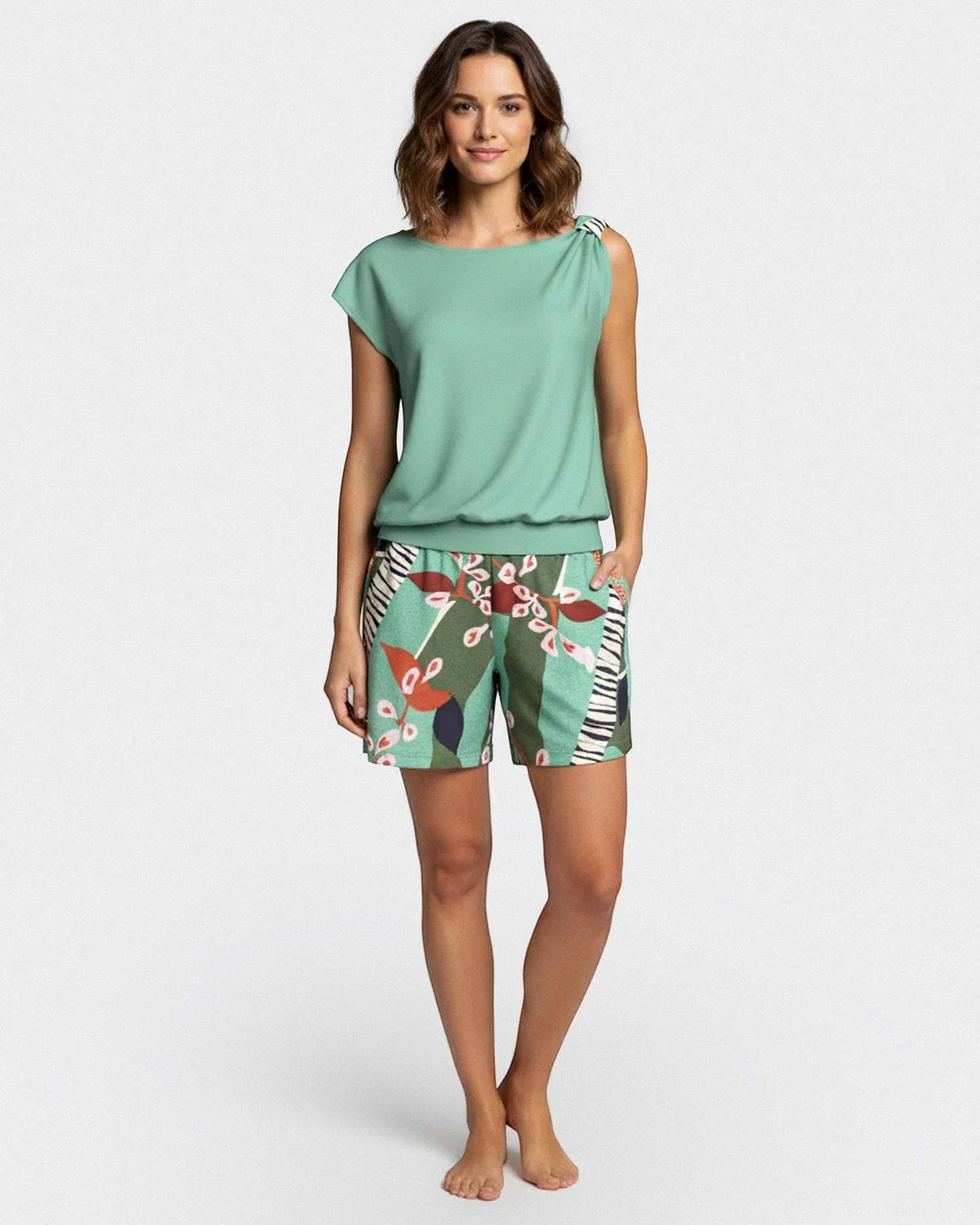 Maison Sarava women's mint green modal lounge set with botanical print shorts and draped shoulder detail.