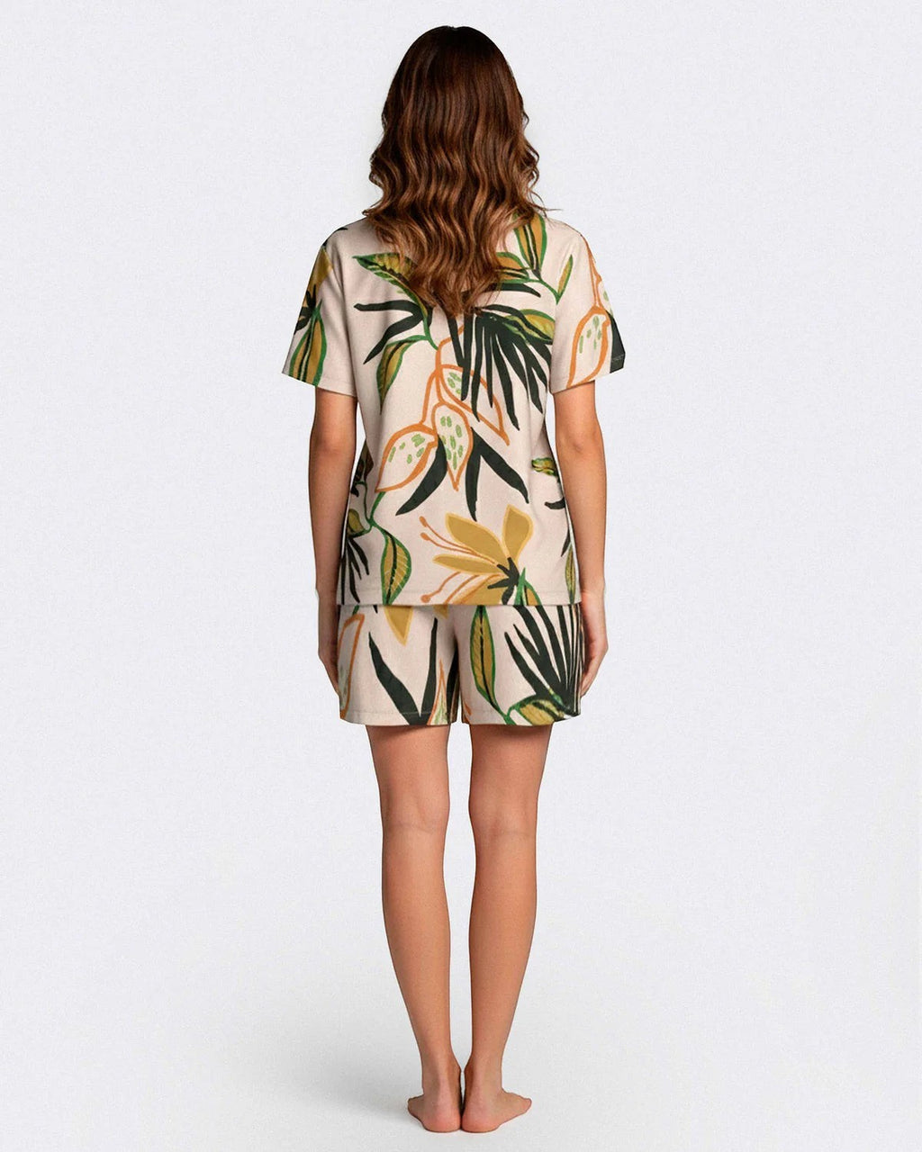 Maison Sarava women's modal lounge set with tropical print, short sleeves, lapel collar, and shorts with pockets.
