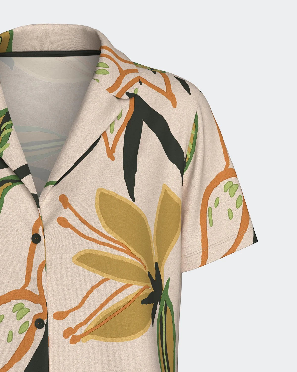 Maison Sarava women's beige modal lounge set with tropical print, lapel collar, short sleeves, and button front.