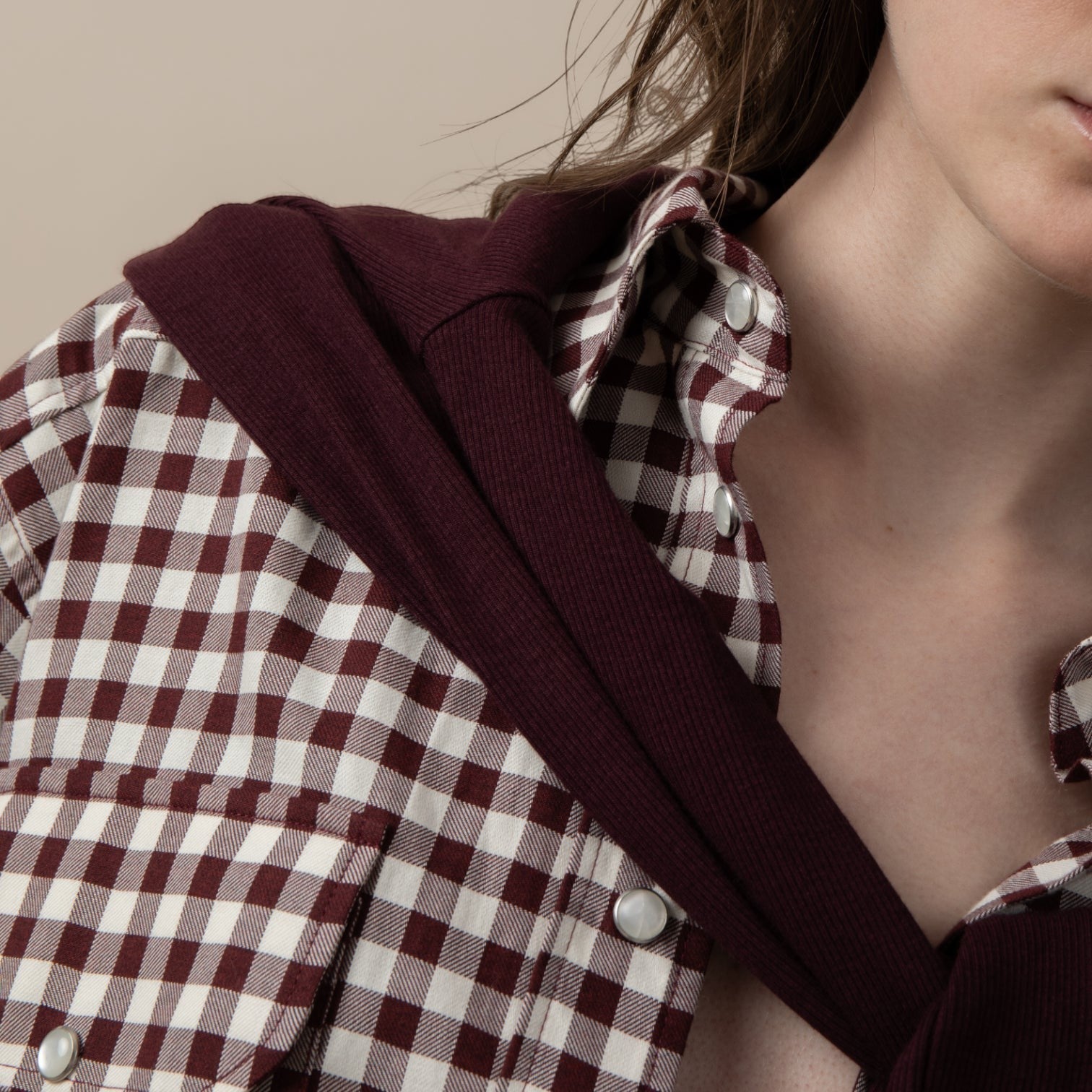 Maison Sarava women's oversized maroon and white gingham western shirt with pointed collar and snap buttons.